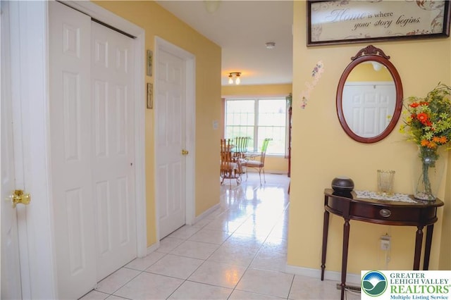 3104 Peacock Dr, Bethlehem Twp, PA 18020 - hall with light tile patterned flooring and baseboards