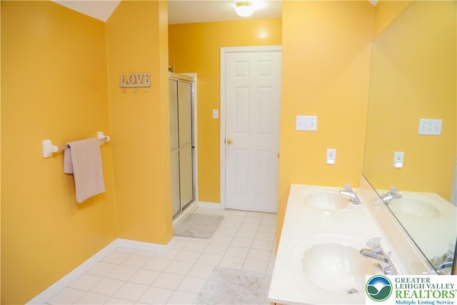 3104 Peacock Dr, Bethlehem Twp, PA 18020 - full bathroom with tile patterned floors, a stall shower, and double vanity