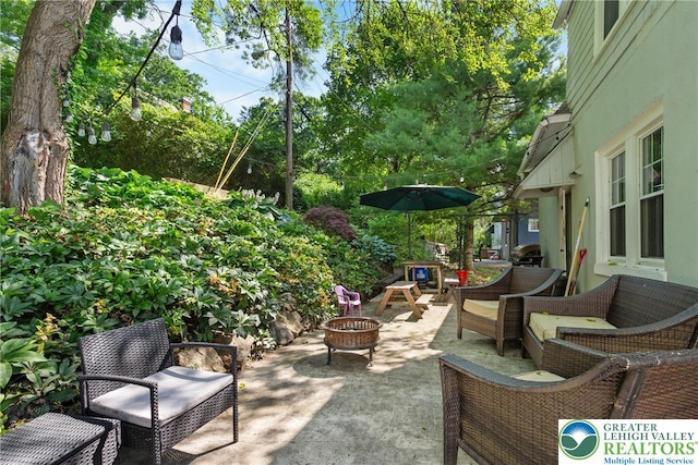 827 Wilbur St, Easton, PA 18042 - view of patio with an outdoor living space with a fire pit