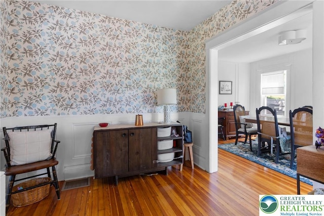 827 Wilbur St, Easton, PA 18042 - sitting room featuring wallpapered walls, a wainscoted wall, and hardwood / wood-style floors