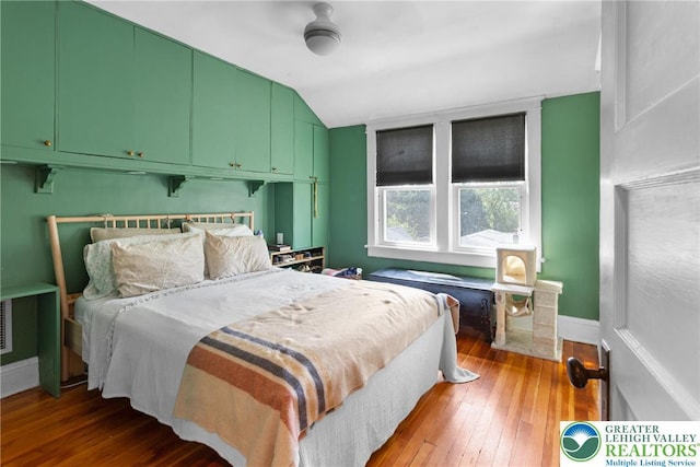 827 Wilbur St, Easton, PA 18042 - bedroom with lofted ceiling and hardwood / wood-style floors