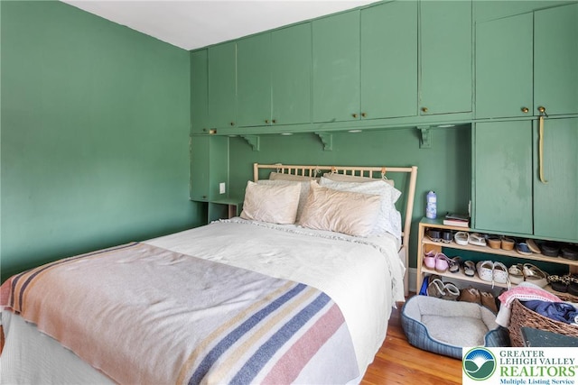 827 Wilbur St, Easton, PA 18042 - bedroom with light wood-style flooring