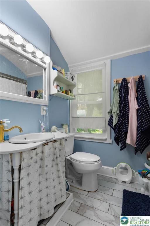 827 Wilbur St, Easton, PA 18042 - bathroom featuring marble finish floors and lofted ceiling