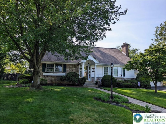 373 Barrett Rd, Emmaus Boro, PA 18049 - view of front of property featuring a chimney, stone siding, and roof with shingles