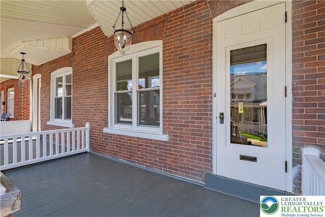 622 N Jefferson St, Allentown City, PA 18102 - view of exterior entry with a porch and brick siding