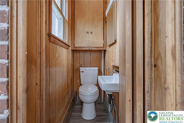 622 N Jefferson St, Allentown City, PA 18102 - bathroom featuring wooden walls and wood finished floors