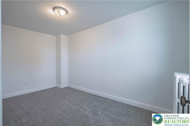 622 N Jefferson St, Allentown City, PA 18102 - spare room featuring carpet flooring and radiator heating unit