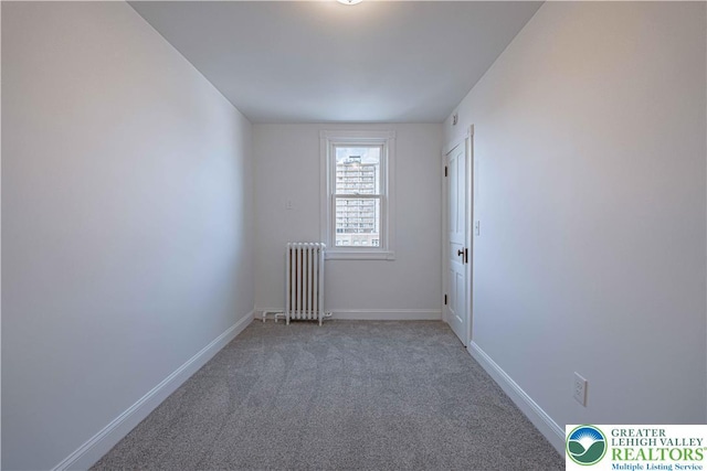 622 N Jefferson St, Allentown City, PA 18102 - empty room with radiator and light carpet