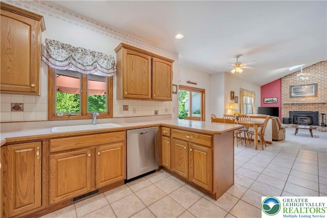 101 Blackstone Dr, Bushkill Twp, PA 18091 - kitchen with dishwasher, light countertops, ceiling fan, light tile patterned flooring, and vaulted ceiling