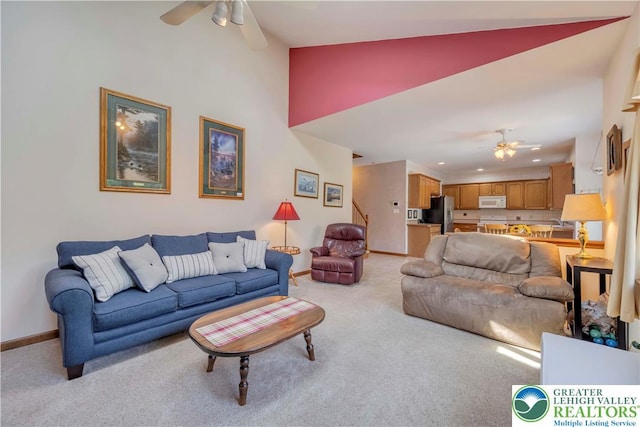 101 Blackstone Dr, Bushkill Twp, PA 18091 - living room with a ceiling fan, light colored carpet, vaulted ceiling, and recessed lighting
