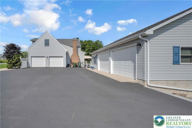 101 Blackstone Dr, Bushkill Twp, PA 18091 - view of property exterior with a garage