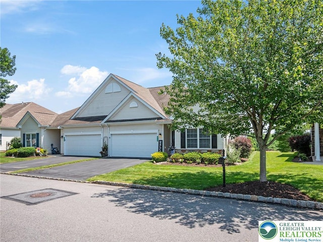4112 Pine Hurst Dr, Allen Twp, PA 18067 - view of front of property with a garage, a front lawn, and asphalt driveway