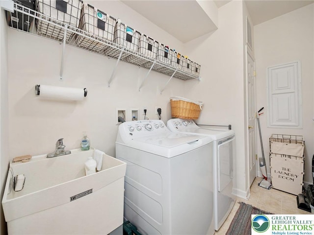 4112 Pine Hurst Dr, Allen Twp, PA 18067 - laundry room with washing machine and clothes dryer and light tile patterned flooring