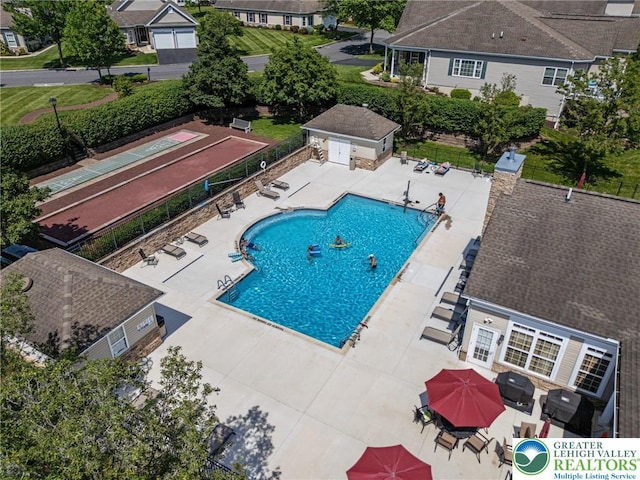 4112 Pine Hurst Dr, Allen Twp, PA 18067 - community pool with a patio area and a grill