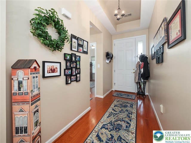 4112 Pine Hurst Dr, Allen Twp, PA 18067 - foyer with wood finished floors, a chandelier, and a raised ceiling