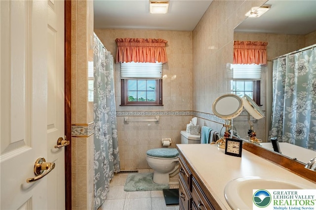 530 Station Rd, Richland Twp, PA 18951 - full bathroom featuring tile walls, plenty of natural light, tile patterned flooring, vanity, and curtained shower