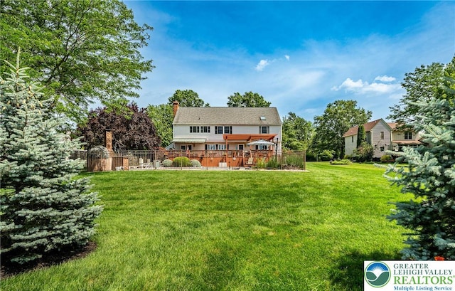 530 Station Rd, Richland Twp, PA 18951 - rear view of house with a wooden deck and a chimney