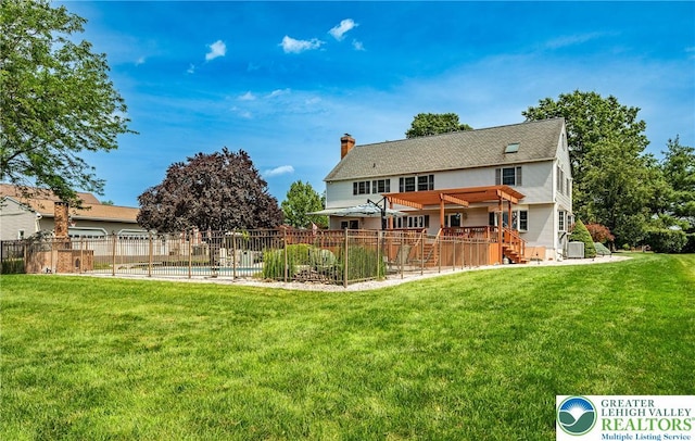530 Station Rd, Richland Twp, PA 18951 - rear view of house with a chimney and a wooden deck