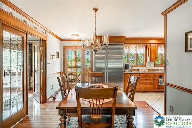 530 Station Rd, Richland Twp, PA 18951 - dining area featuring a chandelier, crown molding, and light wood-type flooring