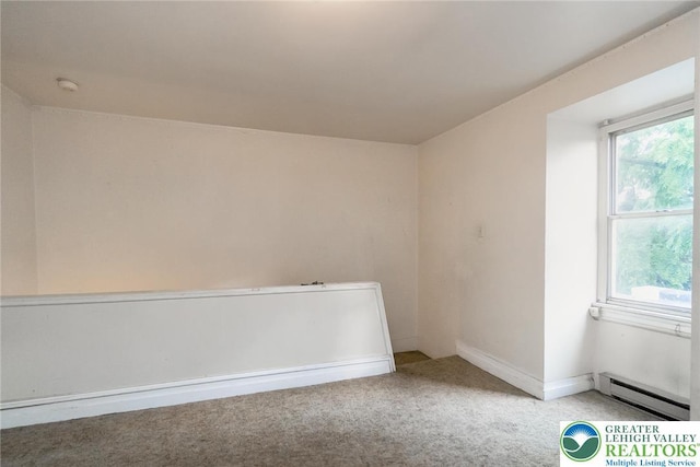 438 N 9th St, Allentown City, PA 18102 - carpeted empty room with baseboard heating and a smoke detector