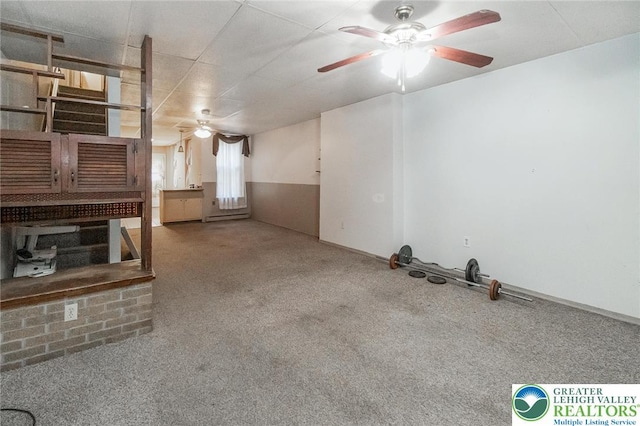 438 N 9th St, Allentown City, PA 18102 - unfurnished living room featuring ceiling fan and carpet flooring