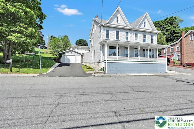 308 Washington St, Tamaqua Boro, PA 18252 - view of front facade with a garage, a porch, and a chimney