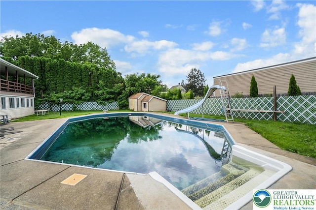 2057 Grove St, South Whitehall Twp, PA 18104 - view of swimming pool featuring a water slide and a shed