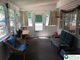618 Mccabe Ln, Hamilton Twp, PA 18353 - sunroom with carpet