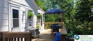 618 Mccabe Ln, Hamilton Twp, PA 18353 - wooden deck with outdoor dining space
