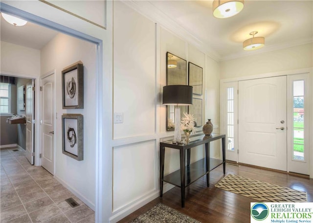 3420 Gentlewind Way Unit Ic 110, Emmaus Boro, PA 18049 - foyer featuring plenty of natural light and crown molding