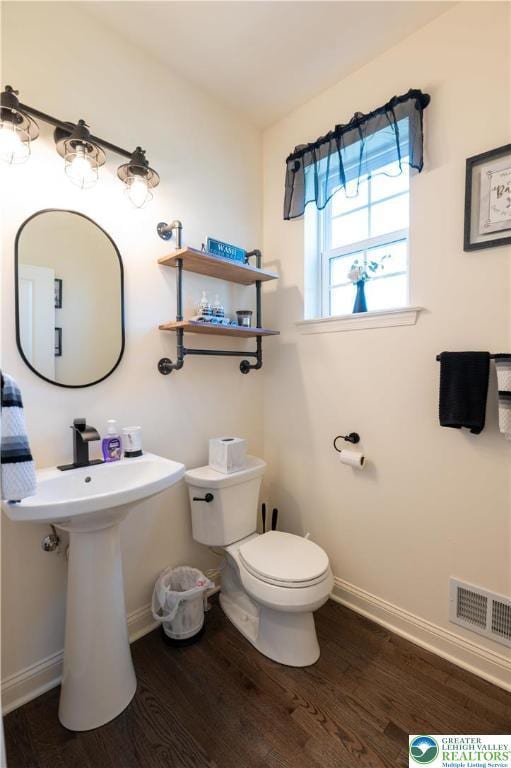 420 Rinaldi Ln, Forks Twp, PA 18040 - half bath featuring wood finished floors and baseboards