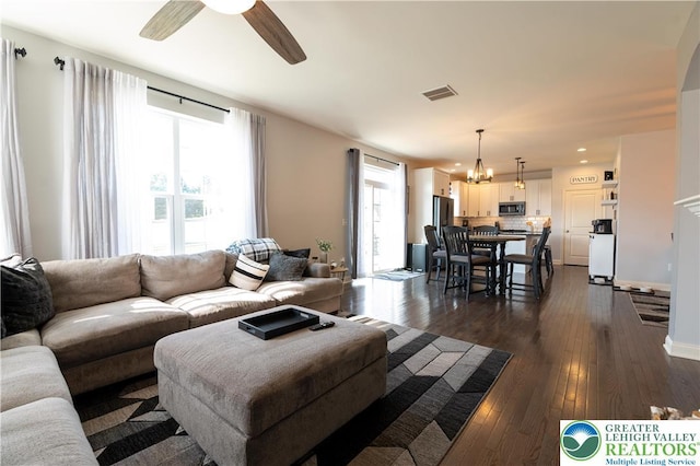 420 Rinaldi Ln, Forks Twp, PA 18040 - living area featuring a chandelier, ceiling fan, dark wood-style flooring, and recessed lighting