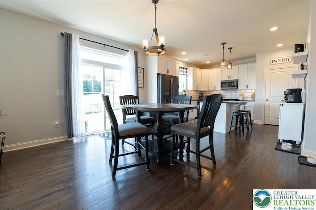 420 Rinaldi Ln, Forks Twp, PA 18040 - dining space with dark wood-style flooring and recessed lighting