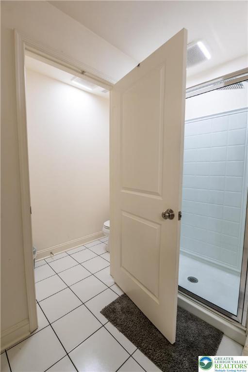 420 Rinaldi Ln, Forks Twp, PA 18040 - bathroom with a shower stall and tile patterned flooring