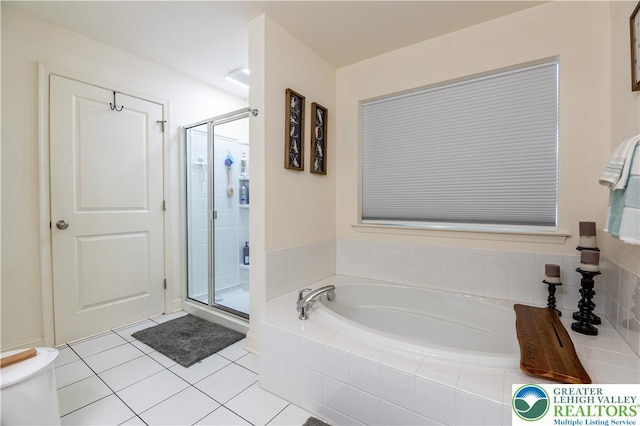 420 Rinaldi Ln, Forks Twp, PA 18040 - full bath with a garden tub, a shower stall, and tile patterned floors