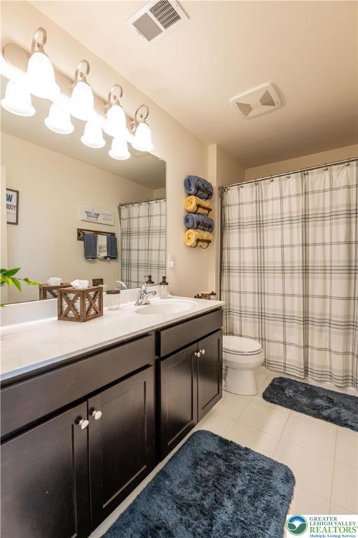 420 Rinaldi Ln, Forks Twp, PA 18040 - bathroom featuring vanity and tile patterned flooring