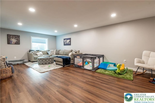 420 Rinaldi Ln, Forks Twp, PA 18040 - living area featuring wood finished floors and recessed lighting