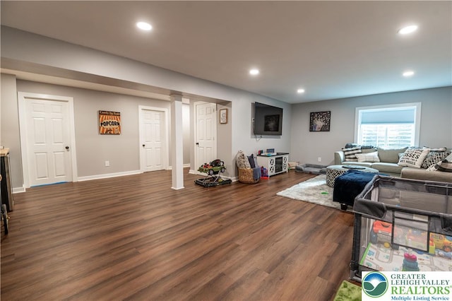 420 Rinaldi Ln, Forks Twp, PA 18040 - living area with dark wood-type flooring and recessed lighting