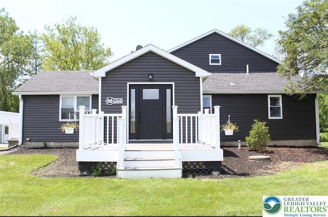 7056 Behler Rd, Lynn Twp, PA 18066 - rear view of property with a yard and a shingled roof