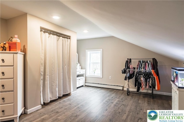 7056 Behler Rd, Lynn Twp, PA 18066 - workout area with a baseboard radiator, wood finished floors, lofted ceiling, and recessed lighting