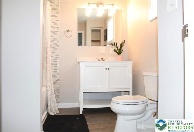7056 Behler Rd, Lynn Twp, PA 18066 - full bath featuring vanity, wood finished floors, and shower / tub combo