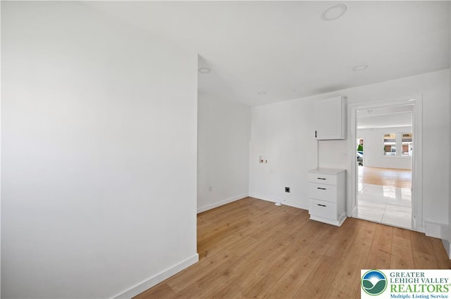 907 N 5th St, Allentown City, PA 18102 - empty room with light wood finished floors