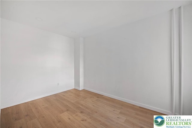 907 N 5th St, Allentown City, PA 18102 - empty room with light wood-style floors and baseboards