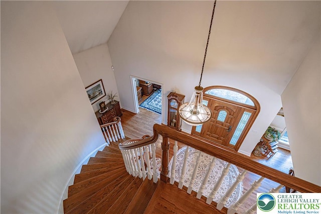 2650 Eagle Ln, Lower Saucon Twp, PA 18055 - stairway with wood finished floors and high vaulted ceiling