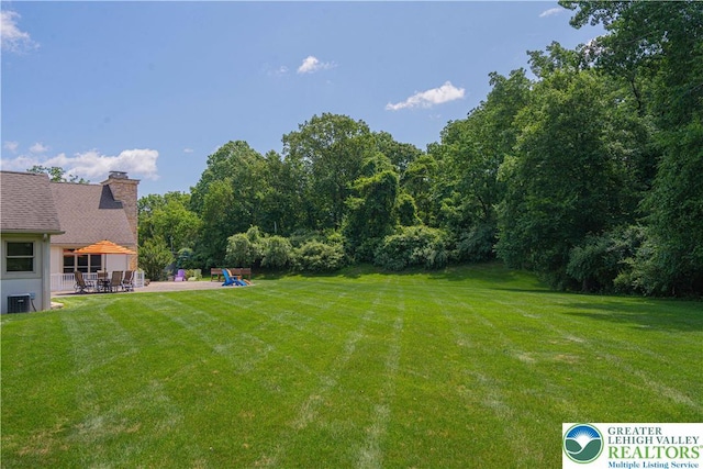 2650 Eagle Ln, Lower Saucon Twp, PA 18055 - view of green lawn featuring a patio and a playground