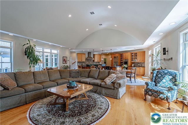 2650 Eagle Ln, Lower Saucon Twp, PA 18055 - living room featuring lofted ceiling, recessed lighting, light wood finished floors, and plenty of natural light