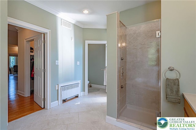2650 Eagle Ln, Lower Saucon Twp, PA 18055 - full bathroom featuring radiator, ornamental molding, a stall shower, vanity, and a spacious closet