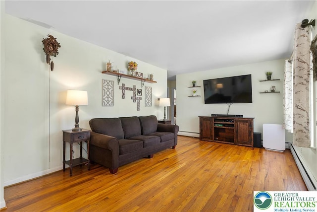 2213 W Woodlawn St, South Whitehall Twp, PA 18104 - living room with hardwood / wood-style flooring, a baseboard heating unit, and baseboard heating