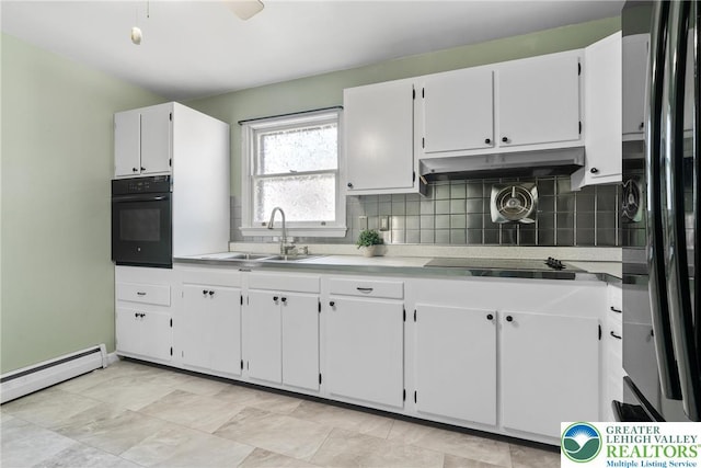 2213 W Woodlawn St, South Whitehall Twp, PA 18104 - kitchen featuring black appliances, under cabinet range hood, backsplash, baseboard heating, and white cabinets