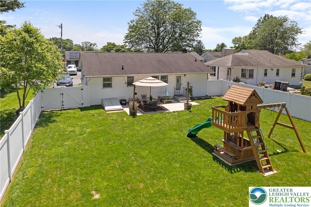 2213 W Woodlawn St, South Whitehall Twp, PA 18104 - rear view of house with a gate, a fenced backyard, a playground, and a patio area